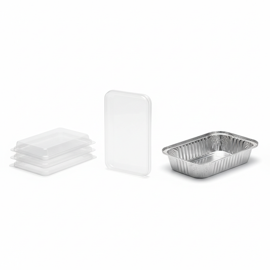 Clear rectangular dome PP lids with squared ends beside a 2 lb aluminum oblong container on a white background